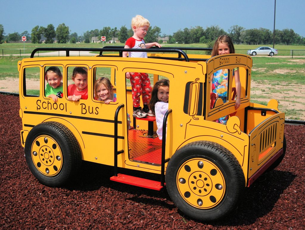 School bus on springs playground equipment