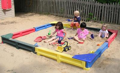 Children Playing in a Sandbox