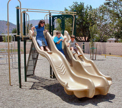 triple slide on playground