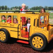 School bus on springs playground equipment